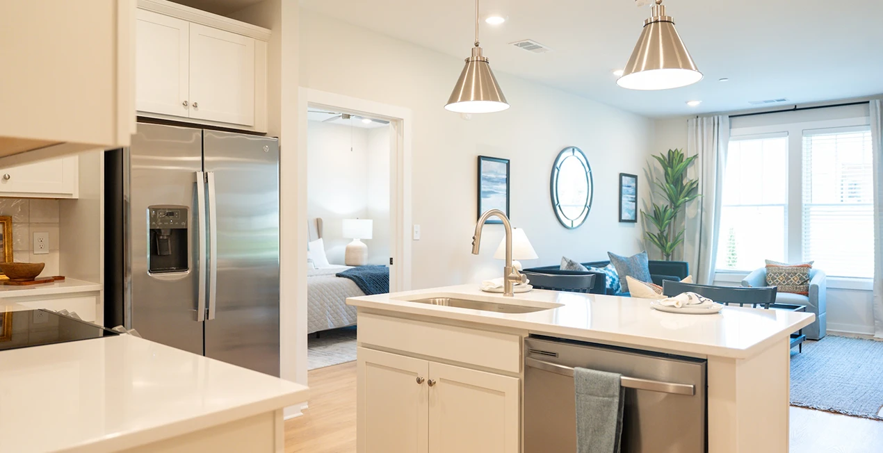 Open kitchen with island sink at arise knox square in Hoover